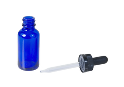 dropper and bottle on white background
