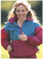 woman jogging, smiling