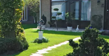 pleasant front yard and front of a house