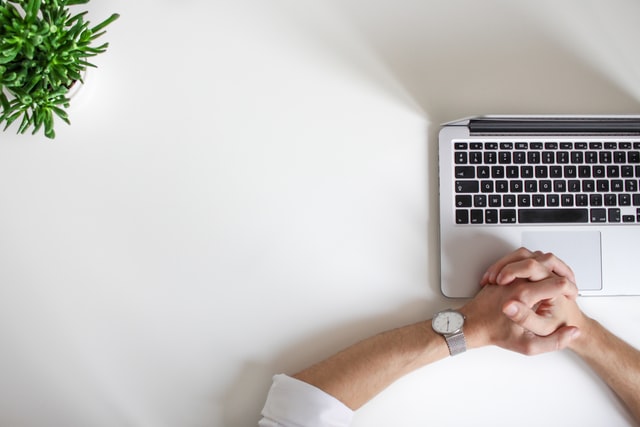 Hands at a computer