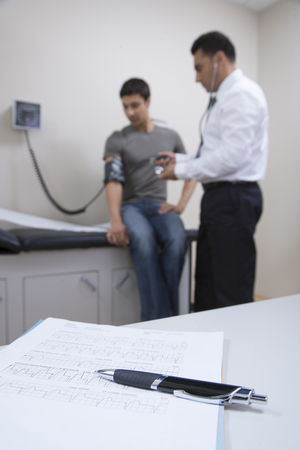 doctor examining patient