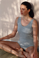 woman sitting in meditation