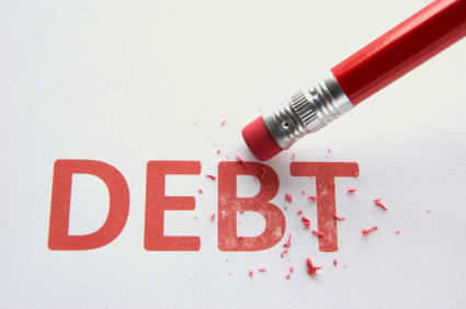 Pencil erasing the word "debt."