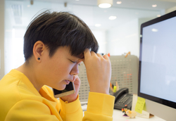 stressed woman at work