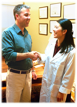 provider shaking hands with patient