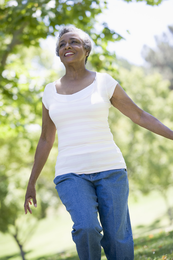 senior woman running in park