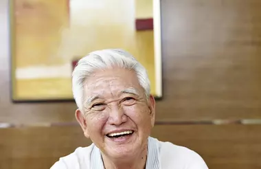 Albert smiling. 