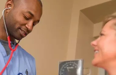 Medical professional with patient