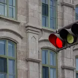 stoplight with city background