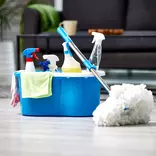a bucket of cleaning supplies