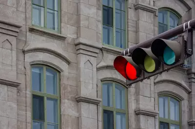 Red traffic light in the city