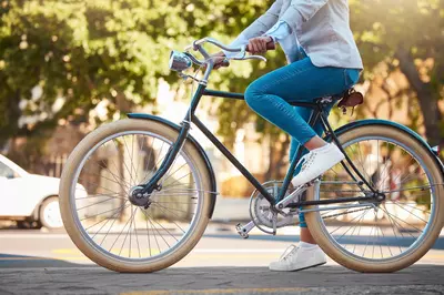 person biking through a neighborhood