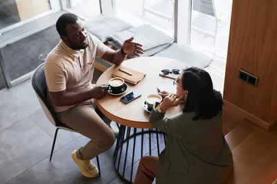 Two People in Cafe High Angle