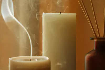 candles and incense on a table
