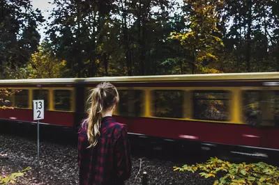 person watching trains go by