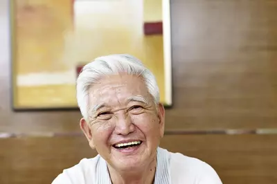 Albert smiling.