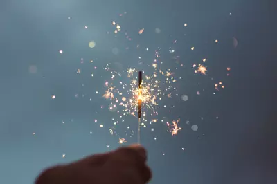 person holding a sparkler