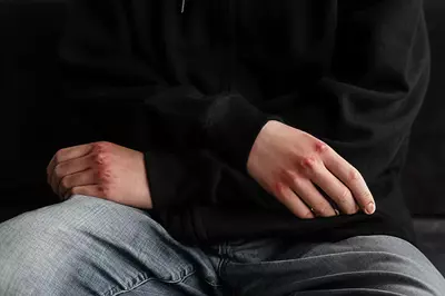 Person crossing their arms.