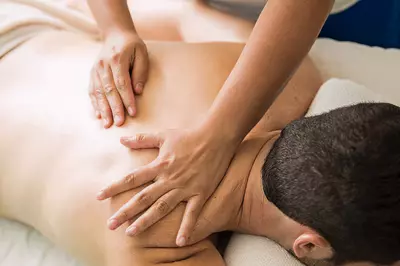 Person receiving massage.