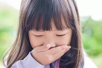 Child experiencing nausea.