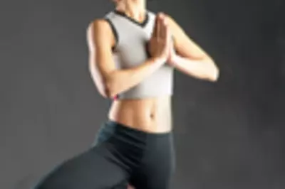 Yoga woman standing in tree pose