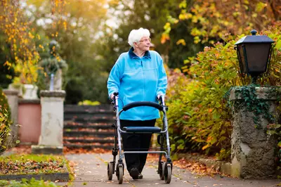 elderly woman walking in a park