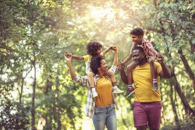 family walking in the park