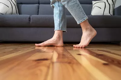 person walking in a living room