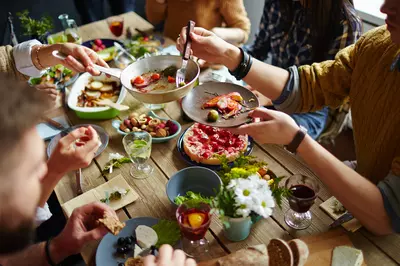 group of people enjoying a meal