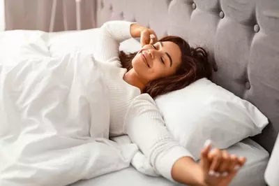 woman laying in bed
