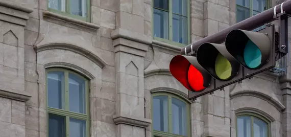 Red traffic light in the city