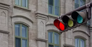 Red traffic light in the city