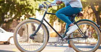 person biking through a neighborhood