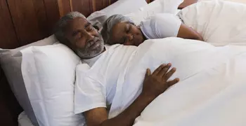 elderly couple sleeping