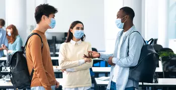 people talking with masks on