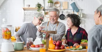 elderly people cooking 