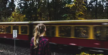 person watching trains go by