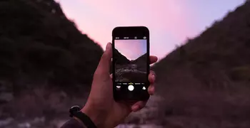 hand holding a mobile phone