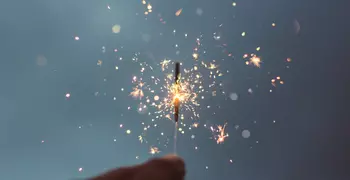 person holding a sparkler