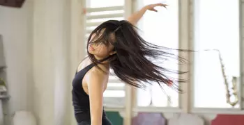 Woman dancing in a dance studio