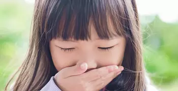 Child experiencing nausea.