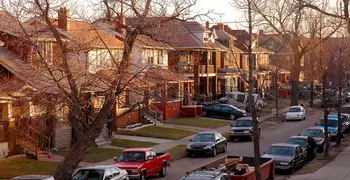 neighborhood with sun setting