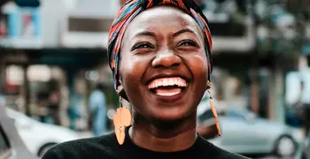 smiling woman wearing headscarf