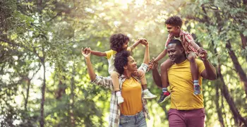 family walking in the park