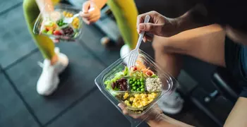 people eating healthy food at the gym