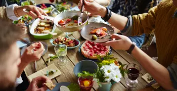 group of people enjoying a meal