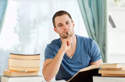 Man thinking at desk