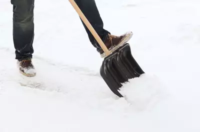 man shoveling snow