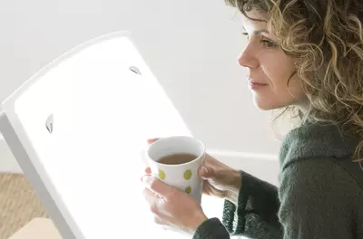 woman with light therapy