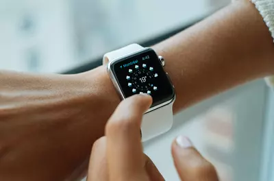 close up of a person's wrist with a large watch on it